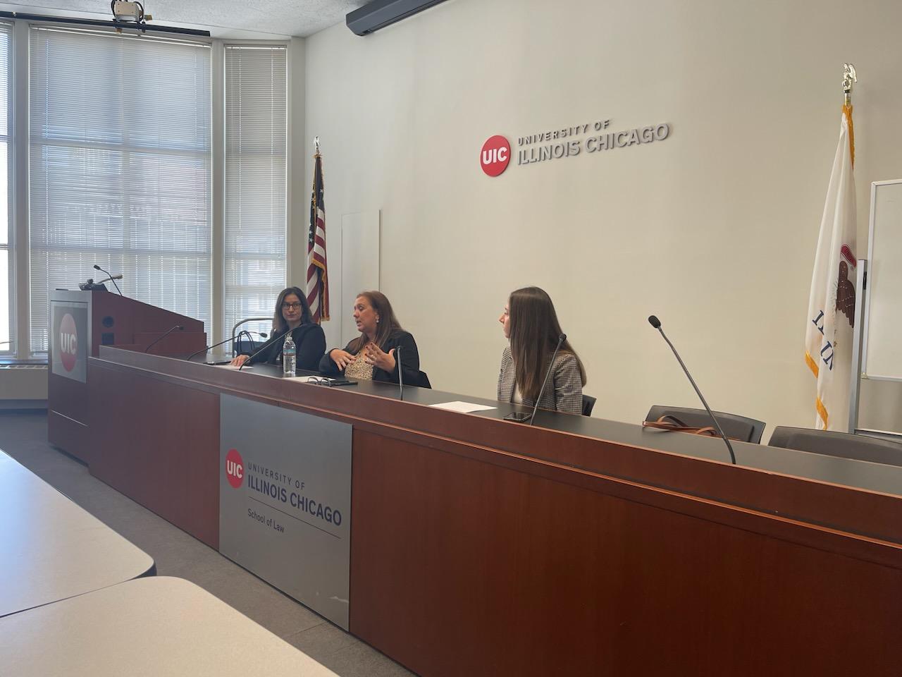 Managing Partner Gina A. DeBoni, Senior Attorney and Director of CLE Debra L. Thomas and Attorney Michelle R. DiSilvestro talk with UIC law students.